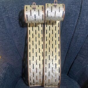 Scroll candle sconces made from olive buckets